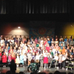 Kindergarten and 1st grade students perform their music program