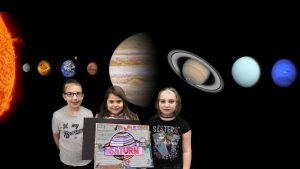 Mrs. Bushman's kids pose in outer space